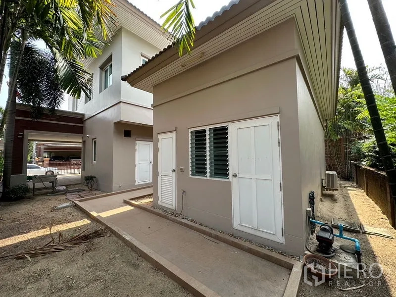 Detached House for rent or sale in Pak Kret, Nonthaburi - Detached utility or maid’s room beside the carport in a gated housing estate.