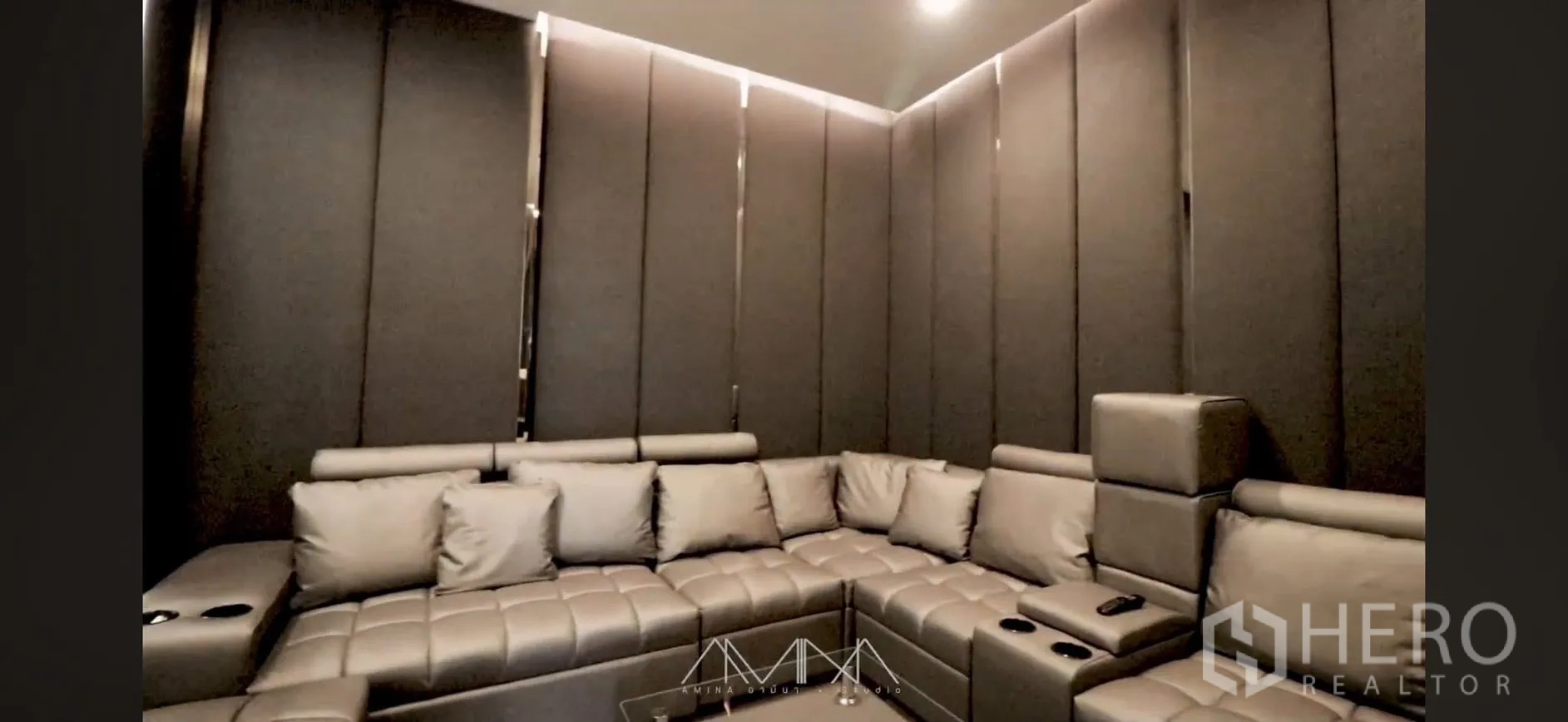 Detached House for rent in Saphan Sung, Bangkok - Home theater with L-shaped recliner seating, cup holders, and acoustic panels.