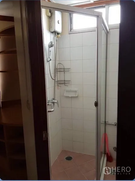 Condominium for rent in Ratchathewi, Bangkok - Tiled bathroom with glass shower enclosure and water heater