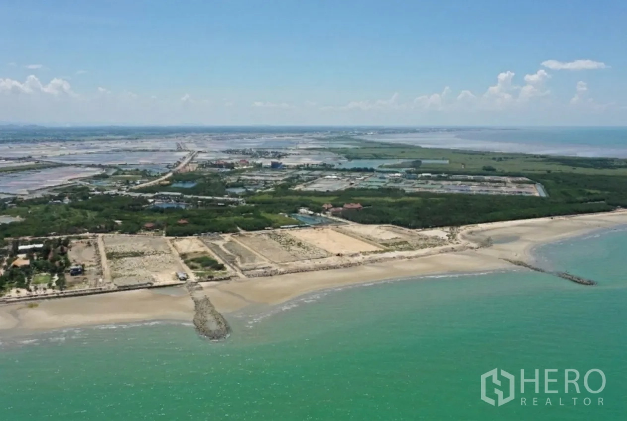 Land for rent or sale in Ban Laem, Phetchaburi - Aerial panorama of coastline, beachfront plots, and surrounding wetlands.