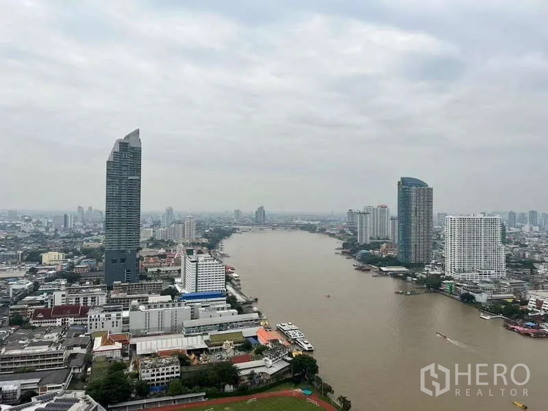 Condominium for rent in Bang Kho Laem, Bangkok - High-rise river panorama overlooking Bangkok and skyline towers.
