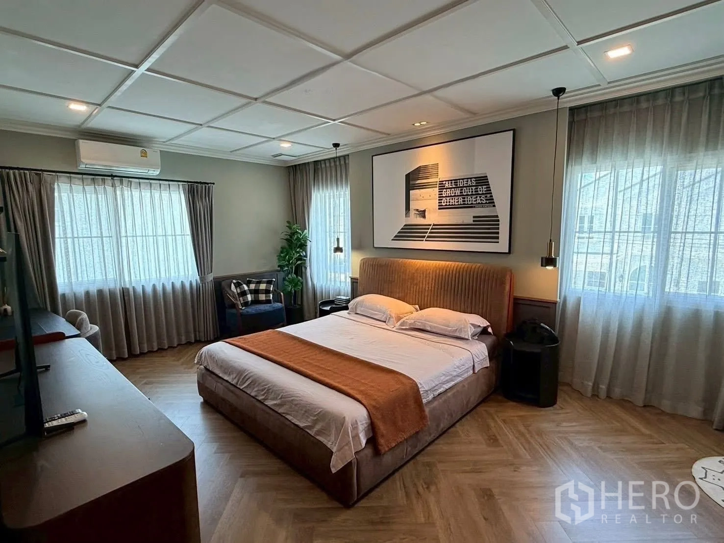 Detached House for rent in Bang Phli, Samut Prakan - Spacious master bedroom with large windows, pendant lights, and seating.