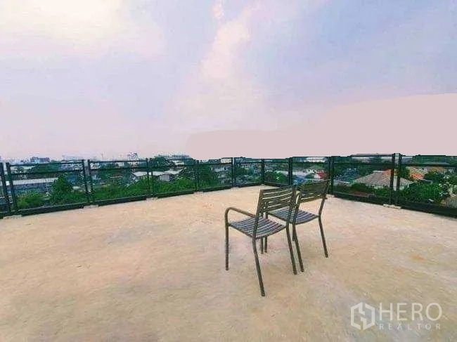 Office Space for rent or sale in Lak Si, Bangkok - Rooftop terrace with safety railing and broad skyline views.