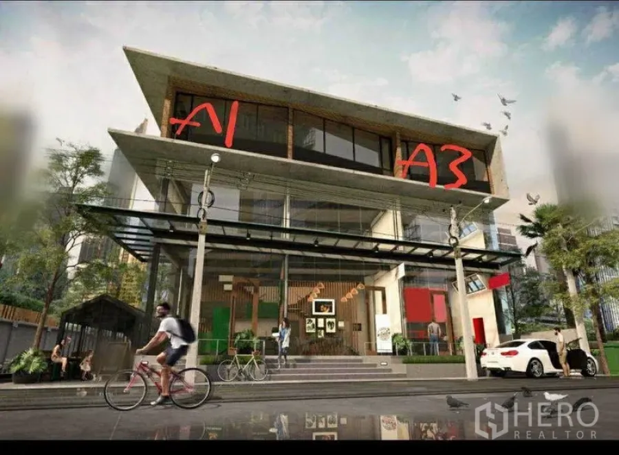 零售空间 出租在Watthana, Bangkok - 现代三层玻璃立面零售建筑，门面宽阔，位于曼谷素坤逸商圈。