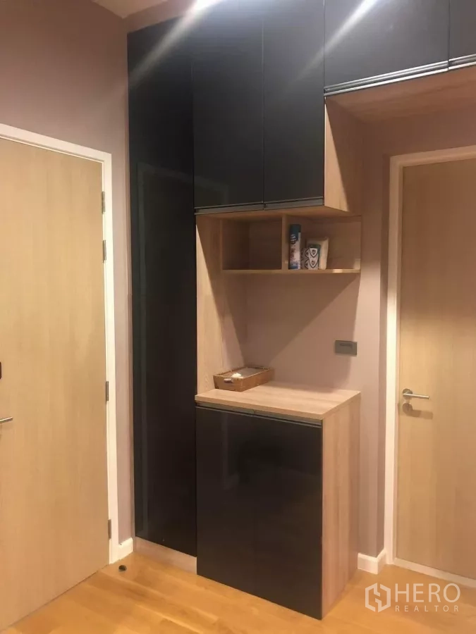 Detached House for rent in Bang Kapi, Bangkok - Upper floor storage cabinets and doors with light wood finishes.