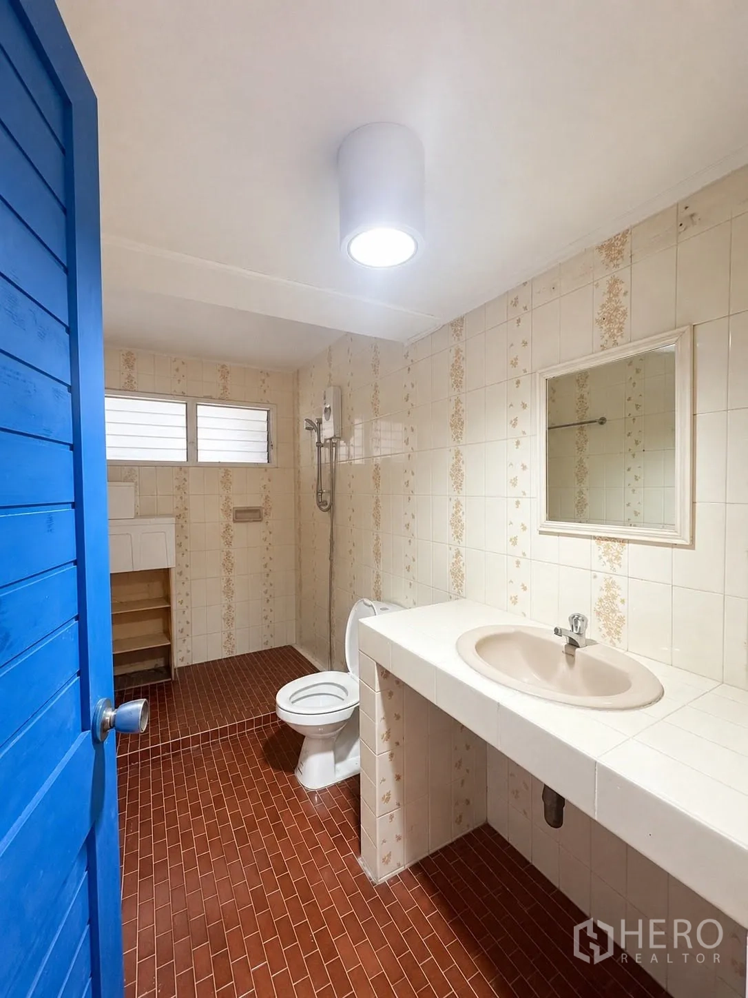 Office Space for rent in Phaya Thai, Bangkok - Bathroom with tiled walls, wide counter and shower unit.