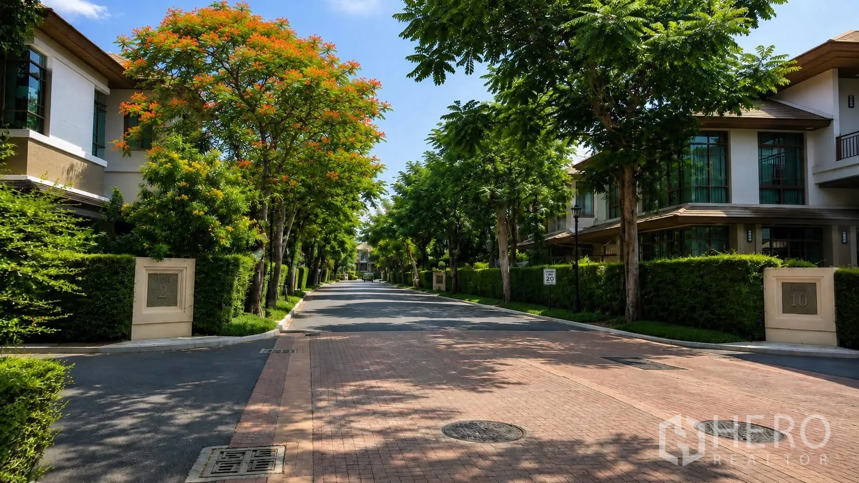 Detached House for rent in Watthana, Bangkok - Tree-lined private residential street within a well-kept community.