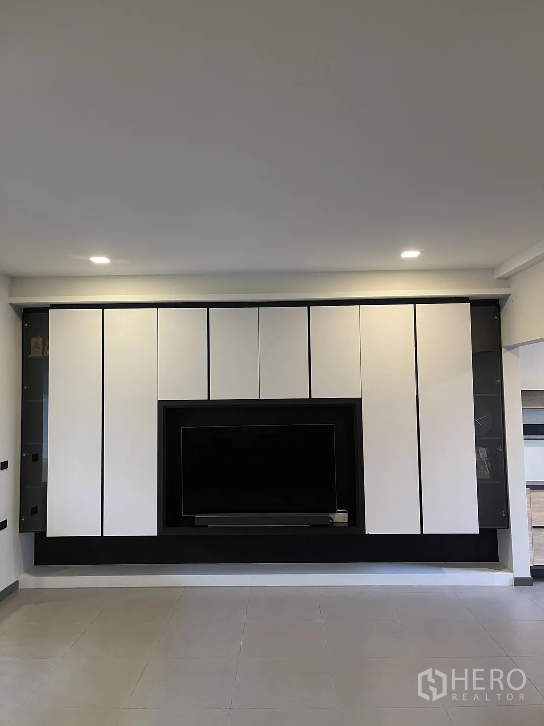 Townhouse for sale in Bang Phli, Samut Prakan - Close-up of the white and black built-in TV wall cabinetry.