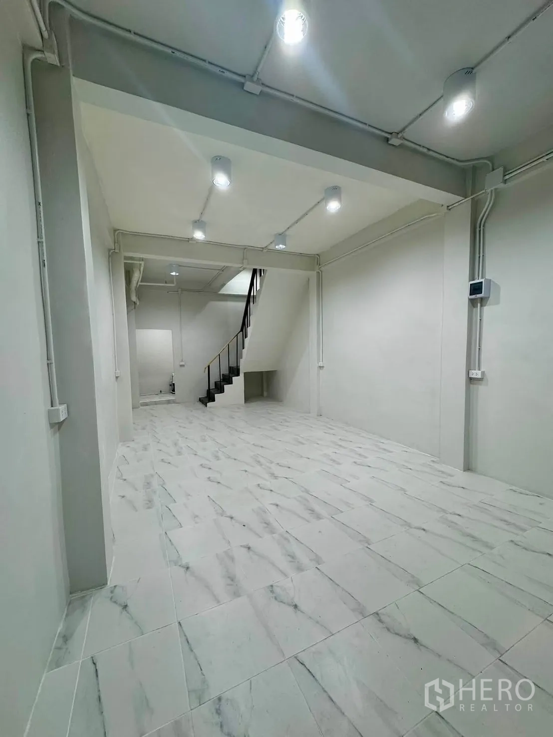 Shophouse for rent in Sathon, Bangkok - Room with window and neutral décor, suitable for office or bedroom.
