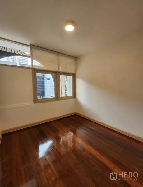 Townhouse for sale - Additional room with window and polished timber flooring.