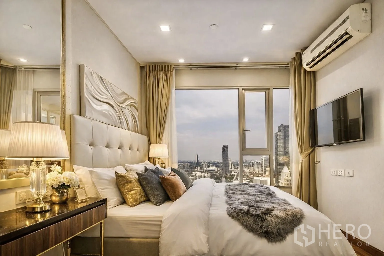 Condominium for rent or sale in Watthana, Bangkok - Bedroom with upholstered headboard and panoramic window overlooking the city.