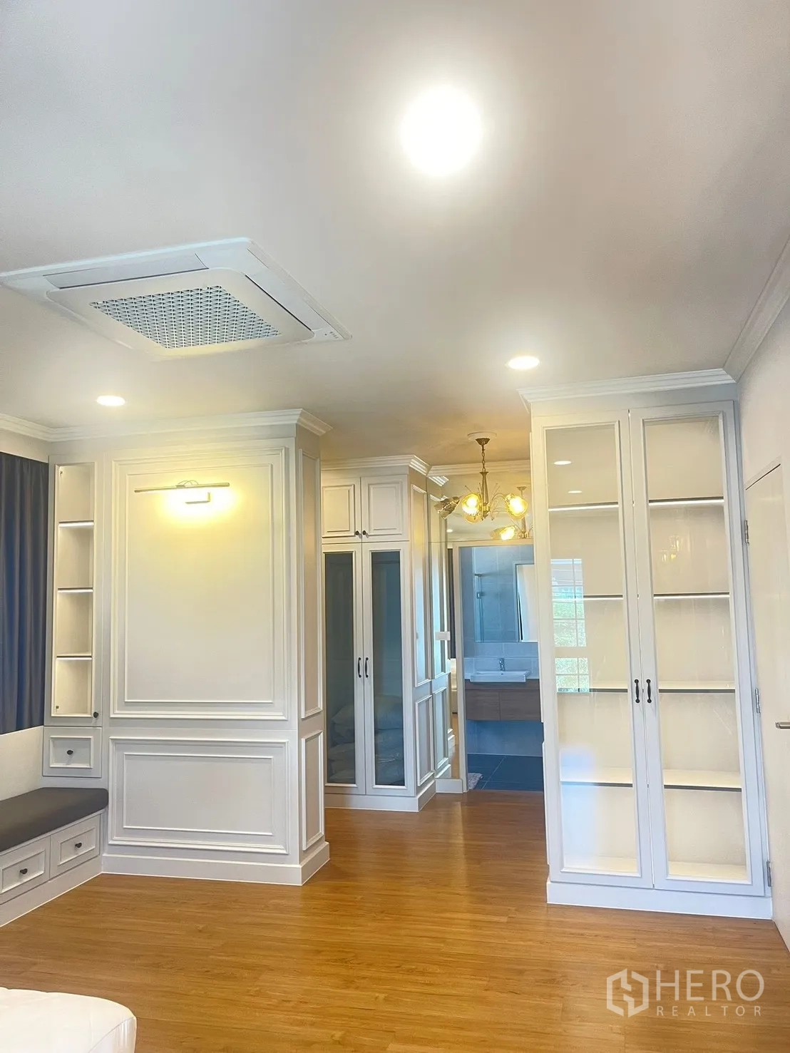 Detached House for rent in Bang Phli, Samut Prakan - Master suite angle with window seat, cabinetry and door to bathroom.