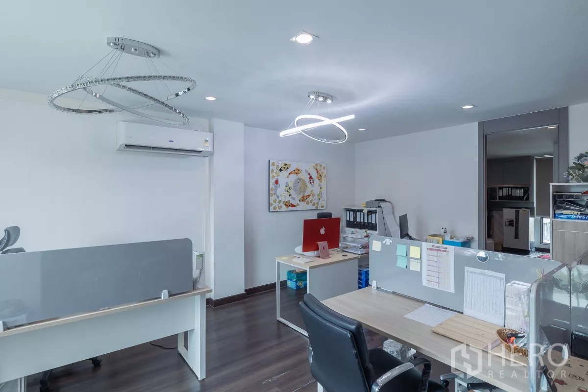 Home Office for sale in Don Mueang, Bangkok - Private office space with desks, LED ring lights, air conditioning and wall art.