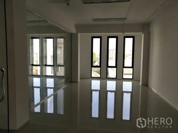 Office Space for rent in Bang Na, Bangkok - Bright workspace with tall narrow windows bringing natural light.