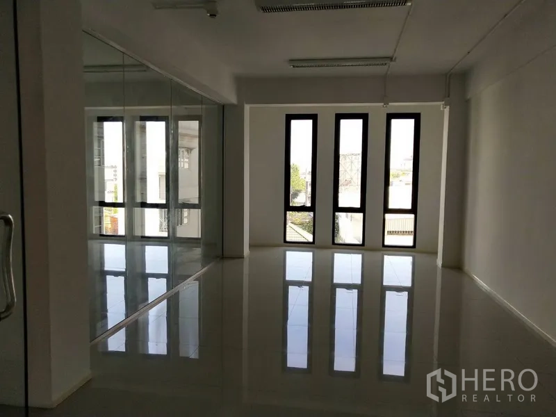 Office Space for rent in Bang Na, Bangkok - Bright workspace with tall narrow windows bringing natural light.