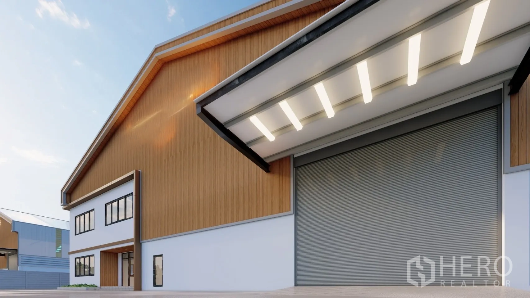 Factory for rent or sale in Lam Luk Ka, Pathum Thani - Close-up of covered loading bay with lighting and a large roller shutter door.