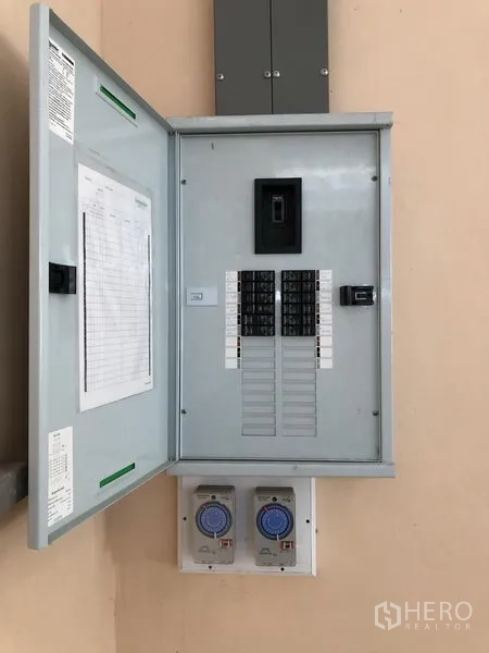 Warehouse for rent in Lat Lum Kaeo, Pathum Thani - Electrical control panel with breakers and timers for the building’s three-phase power.