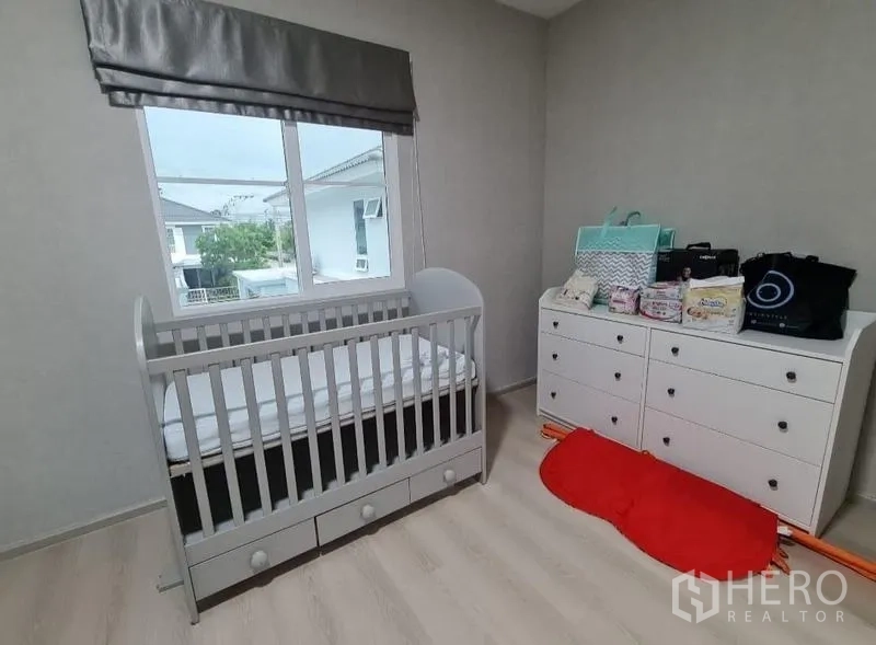 Detached House for rent or sale - Secondary bedroom arranged as a nursery with crib and dresser by the window