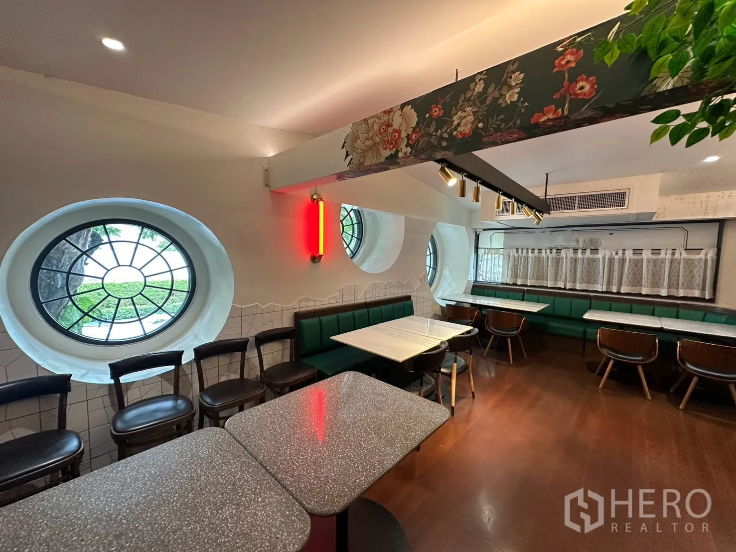 Detached House for rent in Watthana, Bangkok - Spacious dining hall with round porthole windows and pendant lighting.