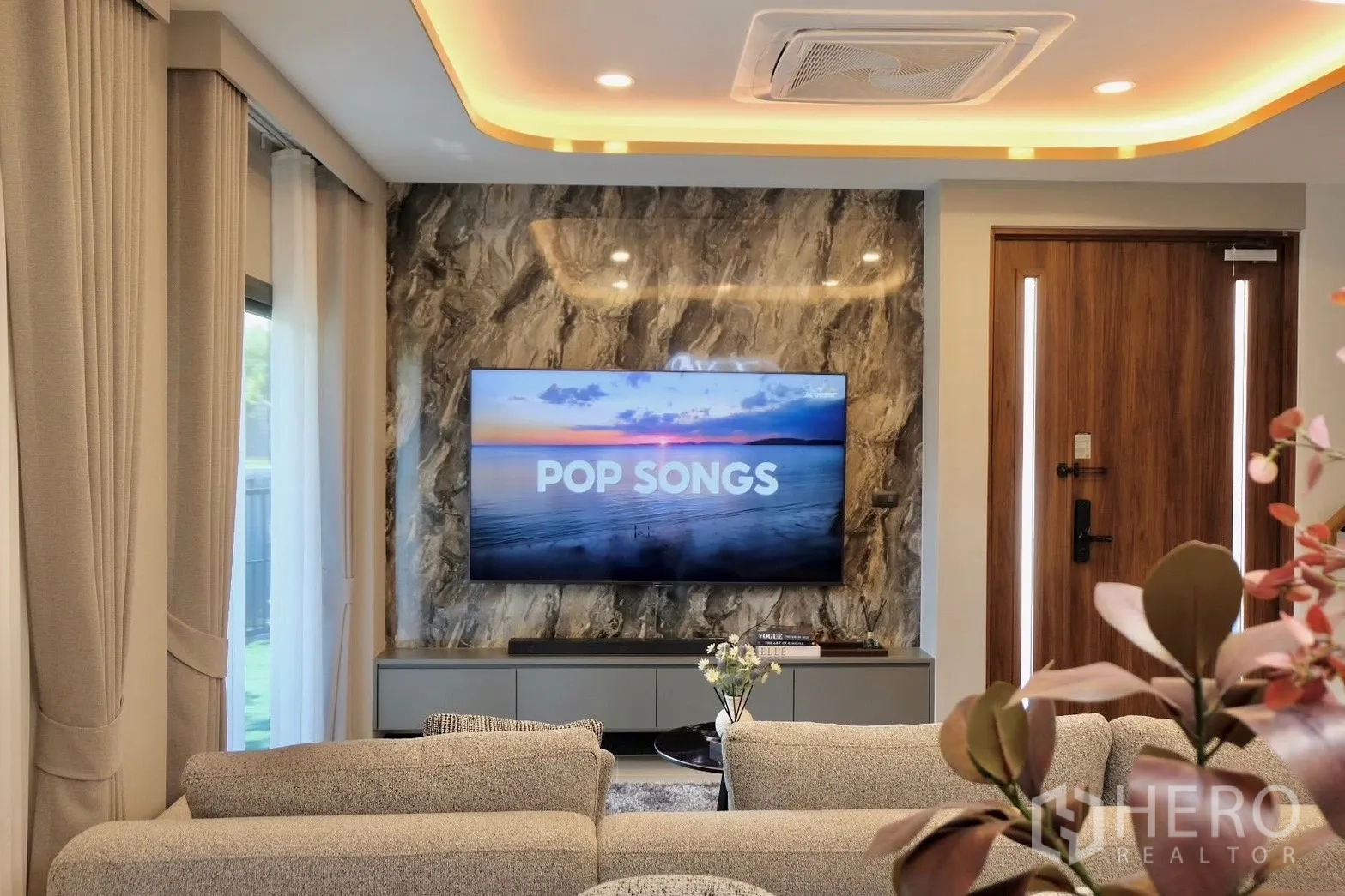 Semi-detached House for sale in Prawet, Bangkok - Spacious dining and living zone under a sculptural LED chandelier.