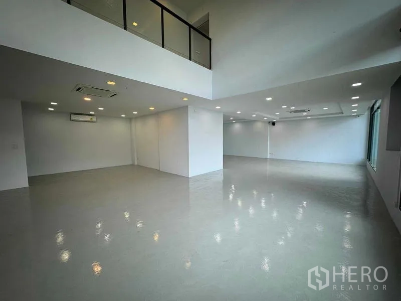 Home Office for rent or sale in Bang Phli, Samut Prakan - Spacious open‑plan white floor with mezzanine and large windows.
