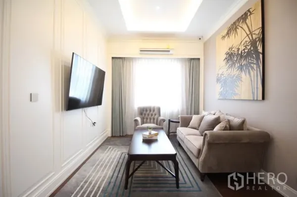 Detached House for rent or sale - Cozy family room with sofa set, wall-mounted TV, window drapes and feature artwork.