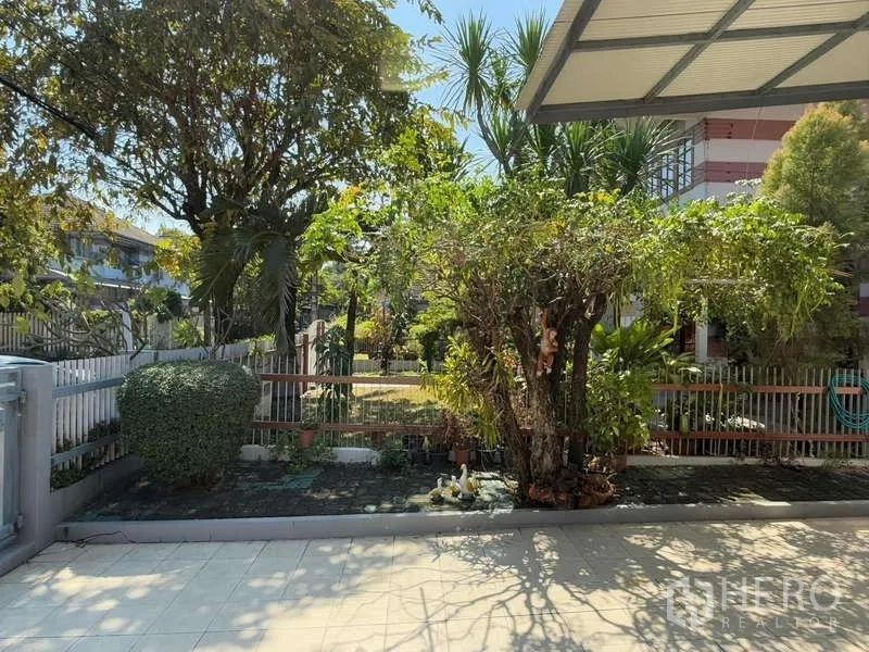 Detached House for rent in Bang Kapi, Bangkok - Shaded patio facing mature trees and landscaped yard at the front.