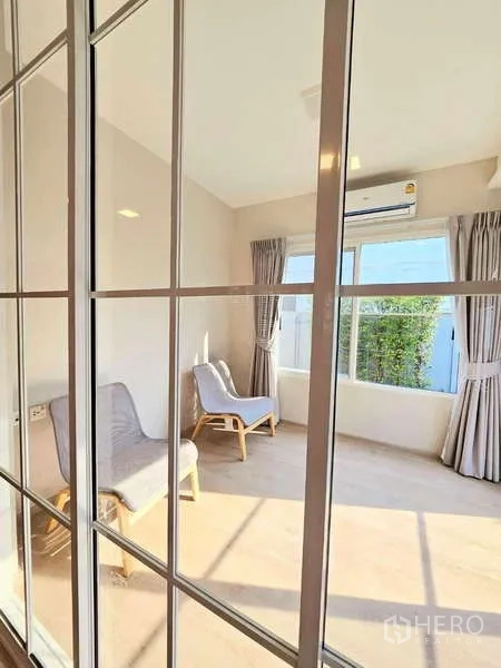 Detached House for rent or sale in Prawet, Bangkok - Utility area with washing machine and large double-door refrigerator.