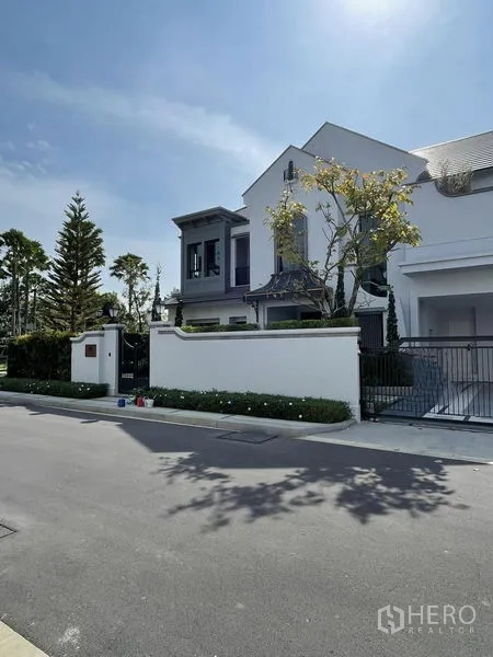 Detached House for sale in Saphan Sung, Bangkok - Contemporary two‑storey detached house with gated wall on a quiet street.