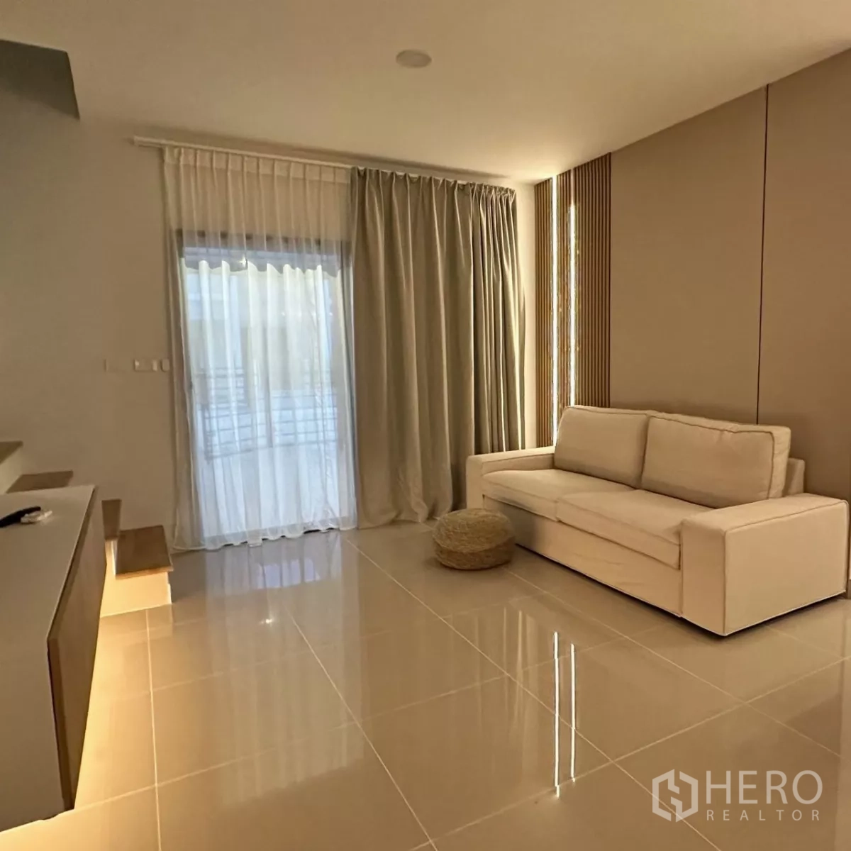 Townhouse for rent in Bang Phli, Samut Prakan - Second bathroom with shower, white tiles and a wood accent wall.