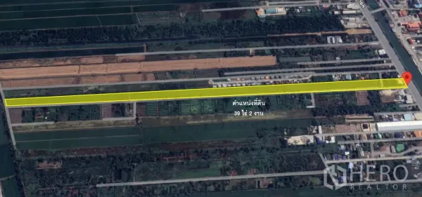ที่ดิน ขายในThanyaburi, Pathum Thani - ภาพถ่ายดาวเทียมมุมสูง เห็นแปลงที่ดินรูปสี่เหลี่ยมผืนผ้า 39.5 ไร่ ขีดเส้นสีเหลือง ติดถนนหลัก 6 เลน