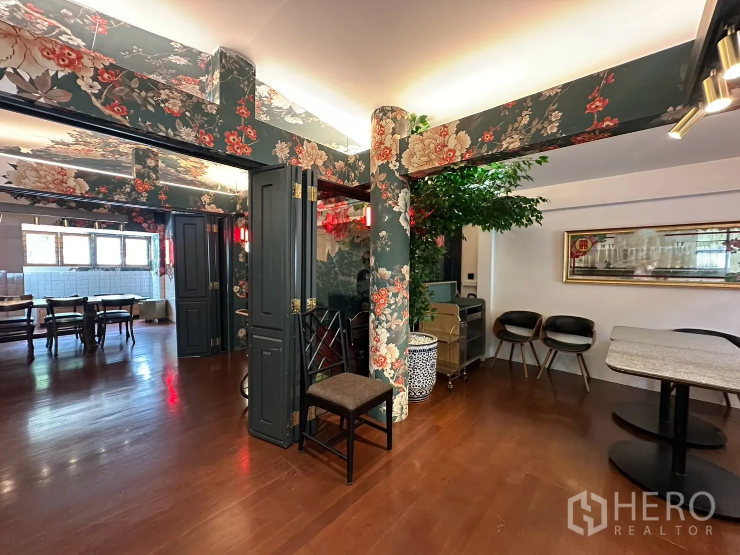 Detached House for rent in Watthana, Bangkok - Entry to dining area with folding doors, chairs, and a service trolley.