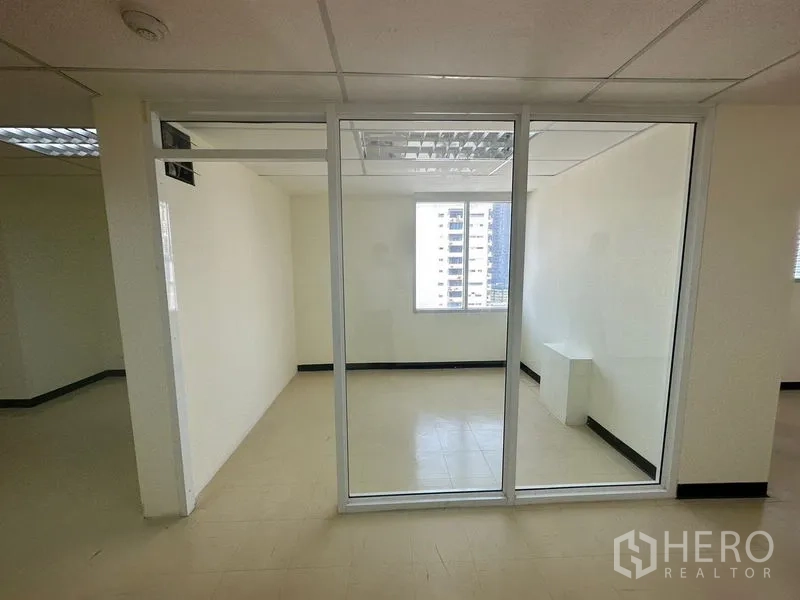 Office Space for rent in Watthana, Bangkok - Enclosed meeting room with full-height glass partition and exterior window.