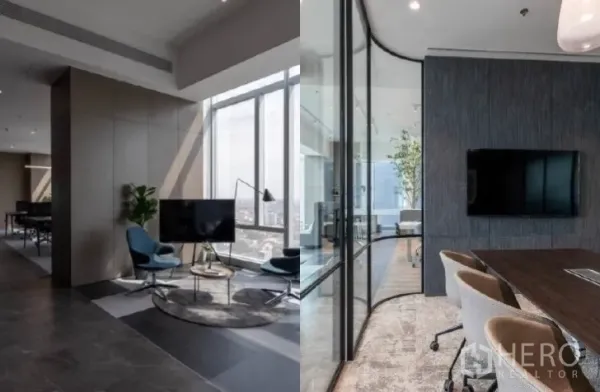Office Space for rent - Contemporary office lounge with seating and TV beside a glass-walled meeting room, featuring floor-to-ceiling windows and city views.