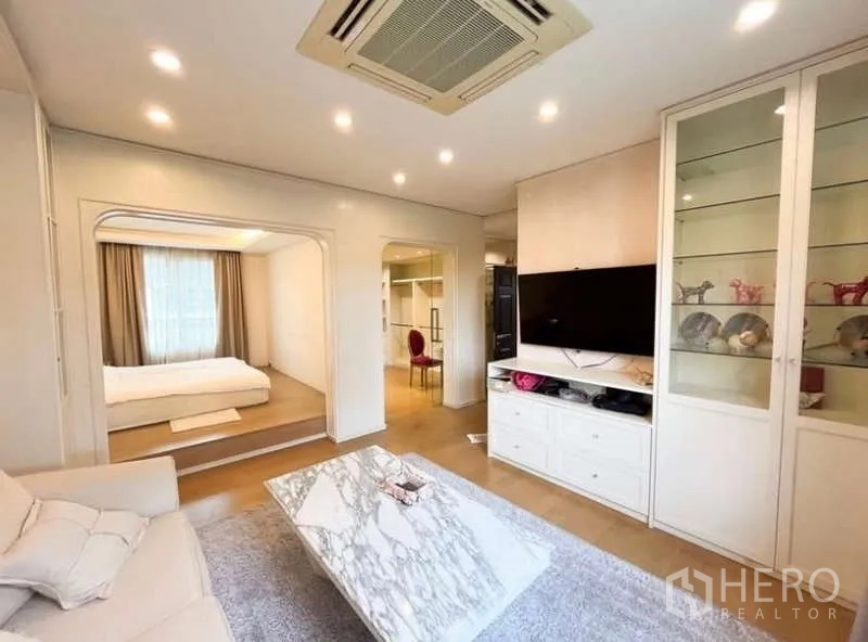 Detached House for rent in Bang Phli, Samut Prakan - Two-storey detached house exterior with private pool, landscaped garden and stone pathway.