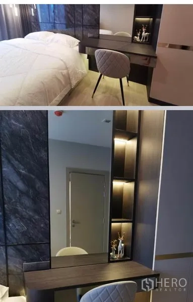 Condominium for rent in Huai Khwang, Bangkok - Detail of dressing area with mirror, open shelves, and warm accent lights