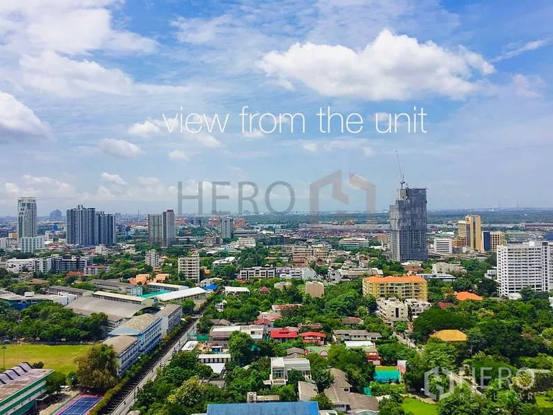 Condominium for sale in Khlong Toei, Bangkok - Panoramic city skyline view from the unit on a clear day.