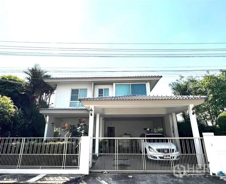 Detached House for rent in Bang Phli, Samut Prakan - Two-storey detached house with gated entrance and a covered two-car carport.