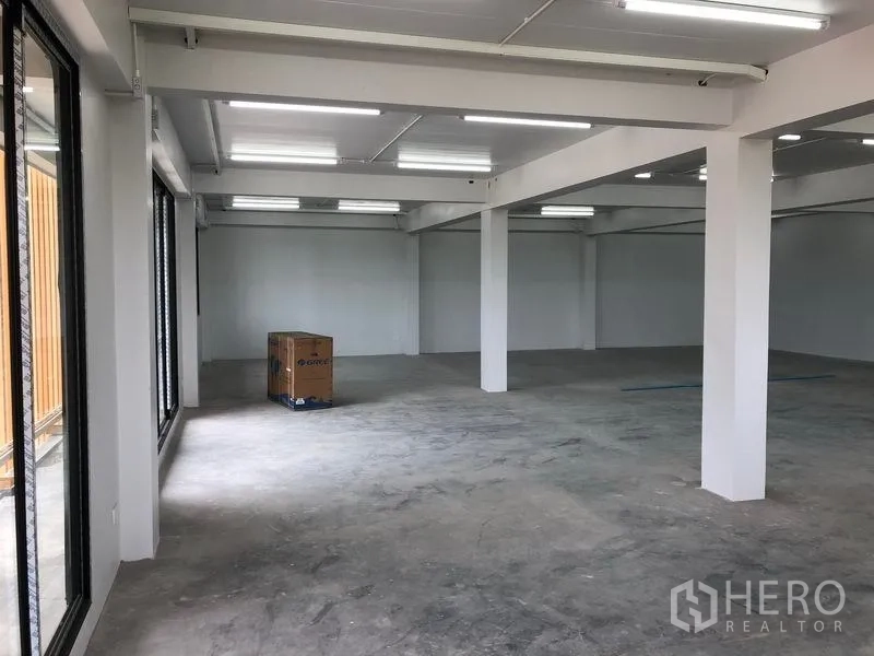 Office Space for rent in Lat Krabang, Bangkok - Bright office interior with LED strip lighting and full-height glazing at the frontage.