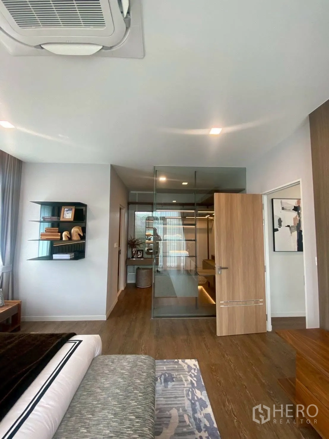 Detached House for rent in Bang Phli, Samut Prakan - Master suite looking toward glass walk-in closet and shelving.