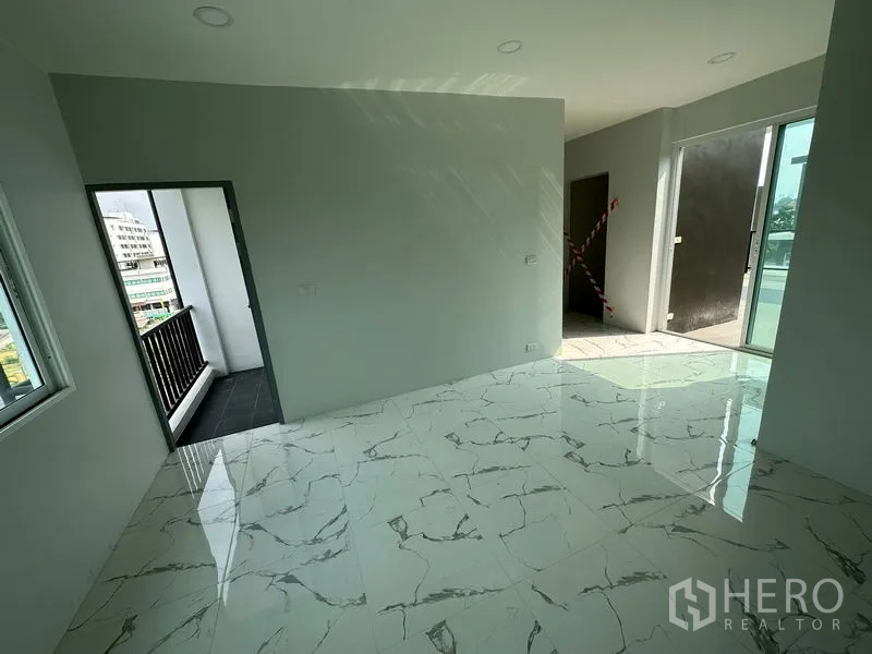 Home Office for rent or sale - Room with balcony access on one side and sliding door to the rooftop terrace on the other.