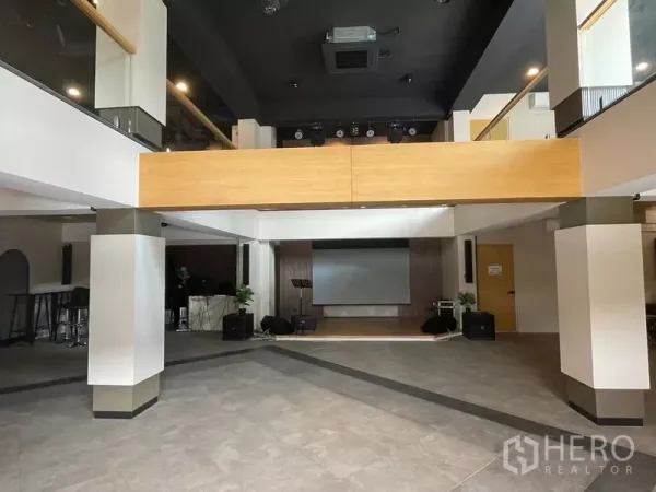 Office Space for rent or sale in Suan Luang, Bangkok - Stage area in the event hall featuring a projector screen, speakers and spotlights.