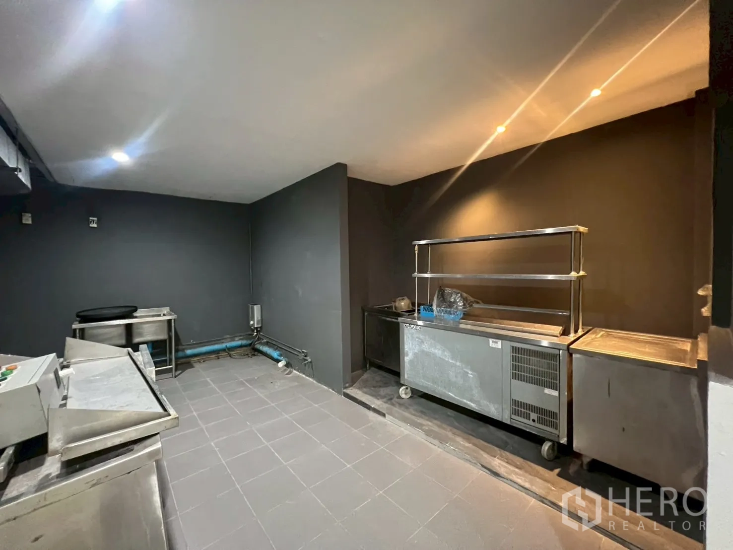Home Office for rent in Watthana, Bangkok - Back-of-house kitchen area with stainless steel counters and prep stations.