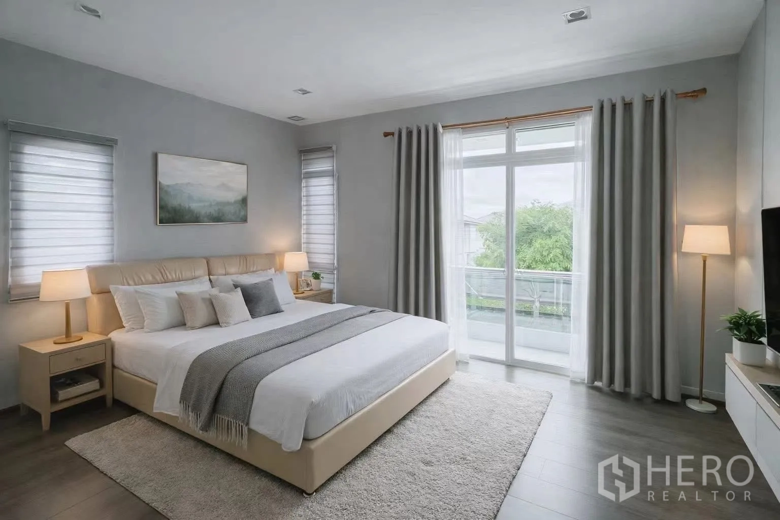 Detached House for rent or sale in Bang Phli, Samut Prakan - Master bedroom with king bed, bedside lamps, and sliding doors to a balcony.