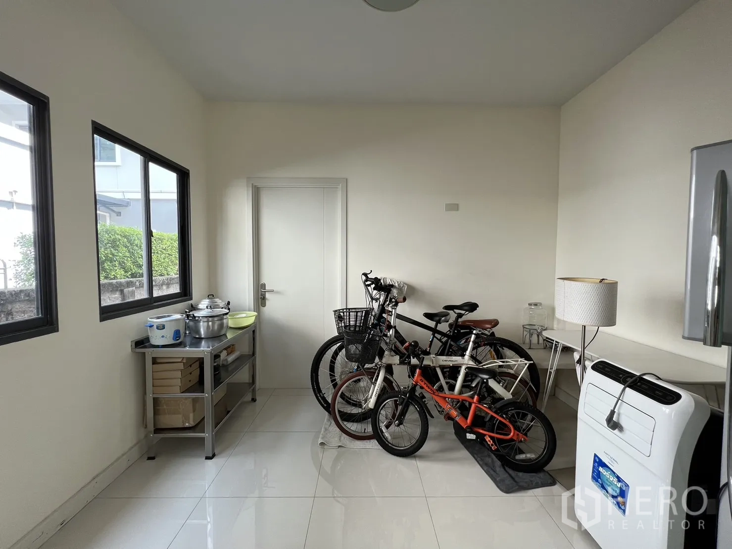 Detached House for sale in Suan Luang, Bangkok - Utility or back kitchen space with windows and storage.