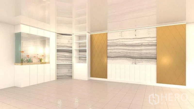 独立式住宅 出租在Lat Phrao, Bangkok - 多功能起居空间，内置置物架、装饰面板与照明鱼缸。