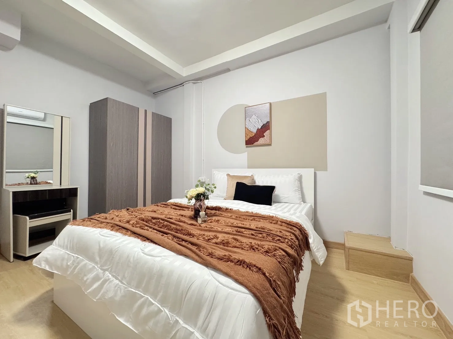 Detached House for rent - Bedroom staged with warm throw blanket and built-in wardrobes.