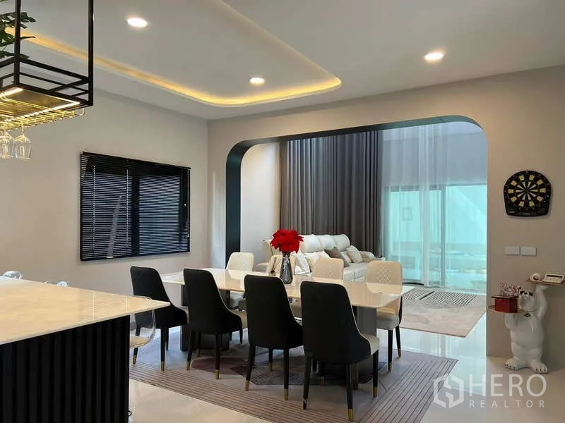 Detached House for rent in Bang Phli, Samut Prakan - Open-plan dining area connected to lounge with recessed ceiling lights.