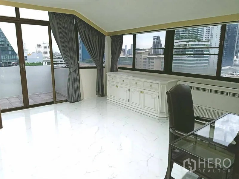Condominium for  in Watthana, Bangkok - Bright study or sunroom with city views and balcony doors.