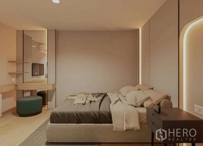 Condominium for rent in Huai Khwang, Bangkok - Cozy bedroom with accent lighting, corner vanity and floating shelves.